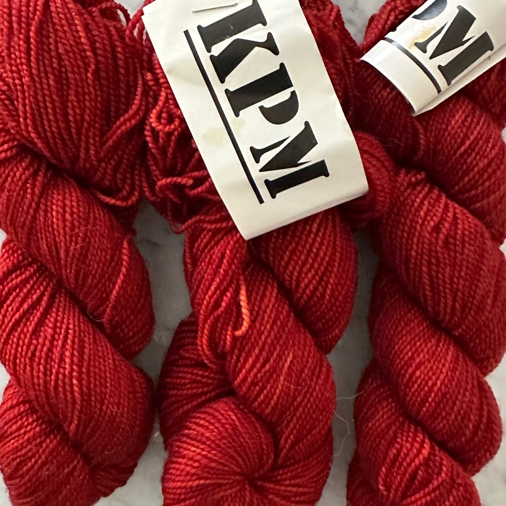 KOIGU Wool Designs. Premium Merino Wool Yarn. Red colorway #1110.